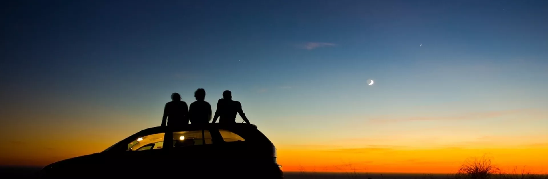 Friends-on-top-of-car-socializing-with-weed-clean-header.webp